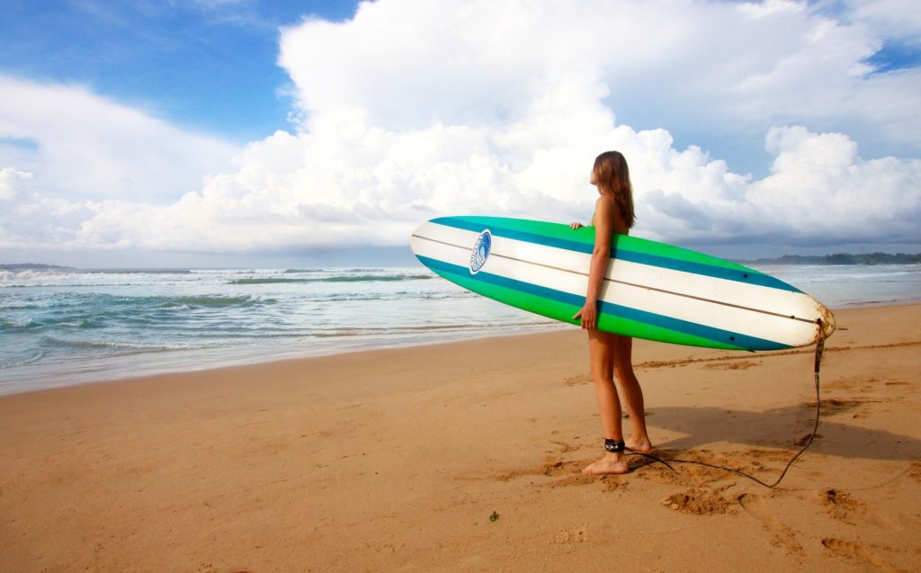 Woman carrying board